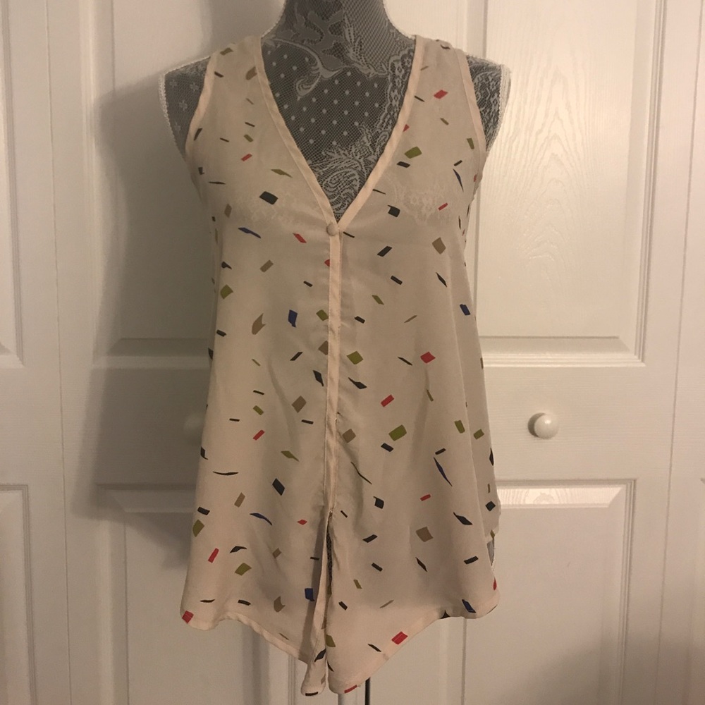 Multi-colored cream based silk/satin top!